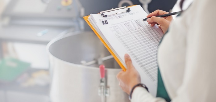 Woman checking standards