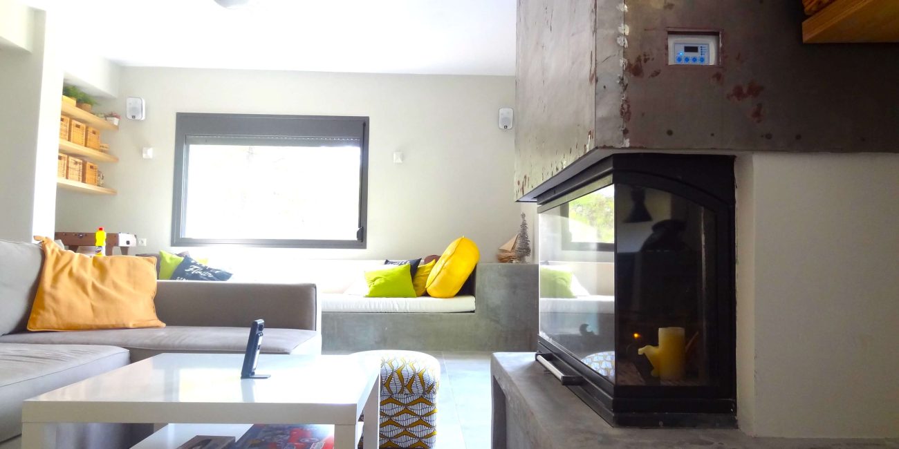 Living room with larg fireplace and furniture